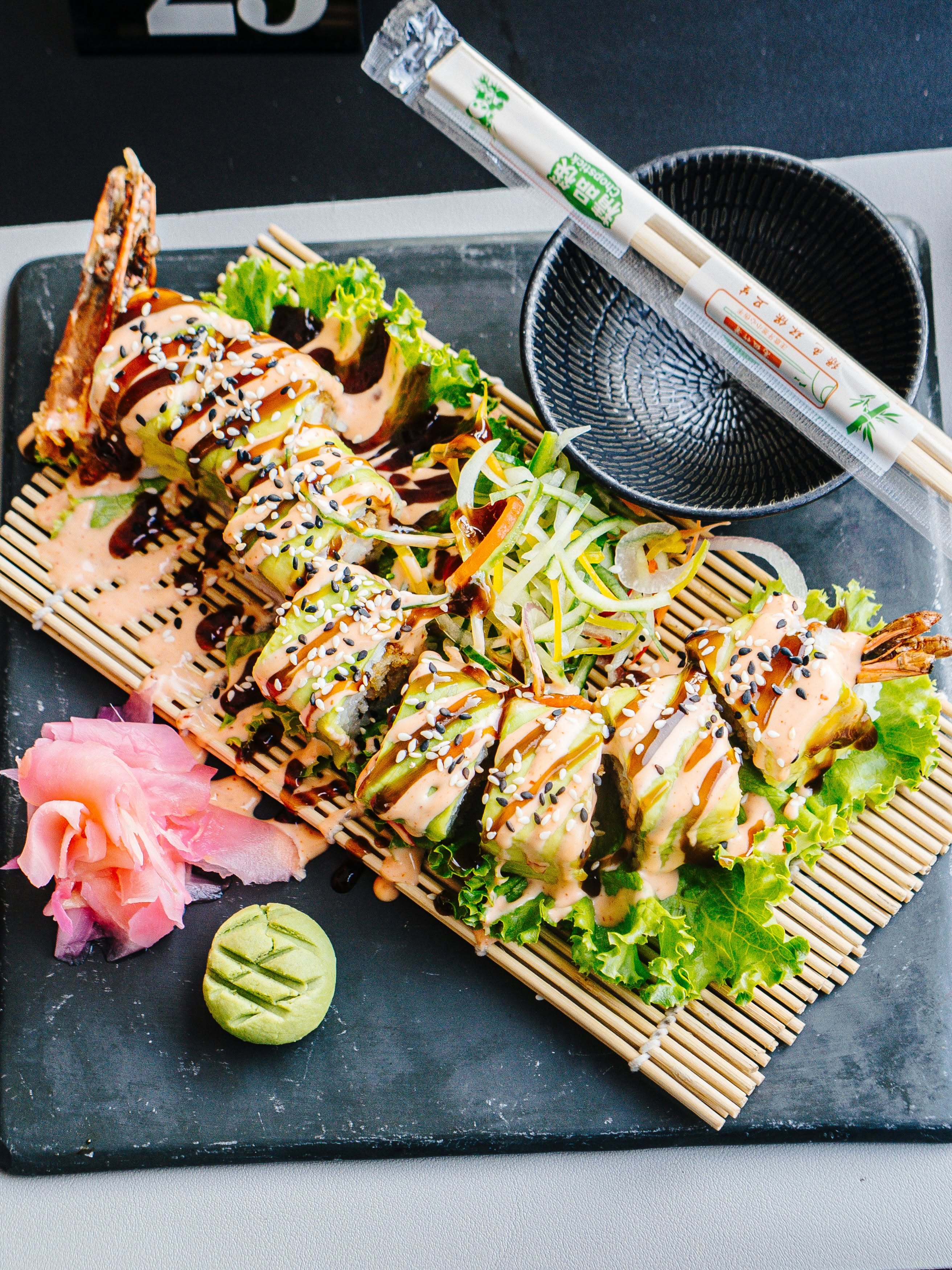 Sushi platter with prawns, avocado and sesame